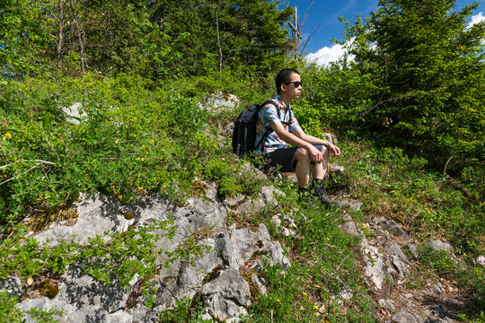 Man sitting on Vodnik Viewpoint, Slovenia