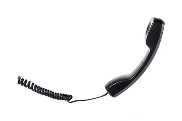 Abandoned handset and a piece of wire. Object on a white background.