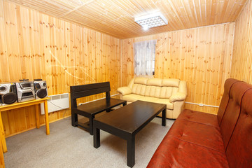 Interior of lounge in wooden sauna house