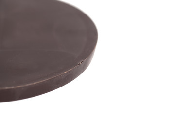 Round chocolate bar isolated on white background