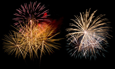 A variety of colorful fireworks isolated on black background