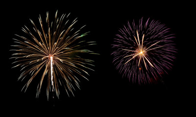 A variety of colorful fireworks isolated on black background