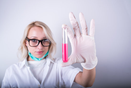 Scientist holding test tube