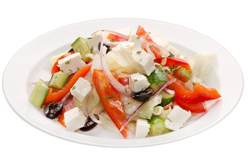 Greek salad. Olives, cheese and vegetables: pepper, cucumber, onion, cabbage on a white plate on a white background