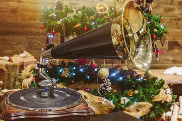 Music on New Year. Christmas tree, gramophone and decoration