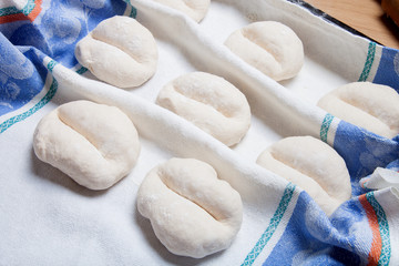 Small balls of dough with flour for pizza or cakes and scones. S
