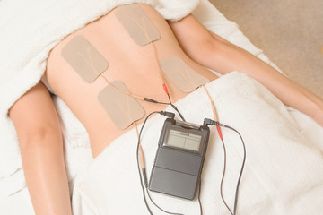 TENs therapy, Electrodes of tens device on back muscle