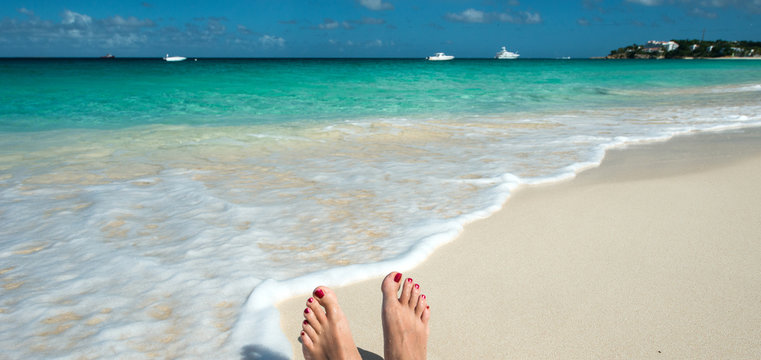 Feet on the beach at Meads Bay, Anguilla Island