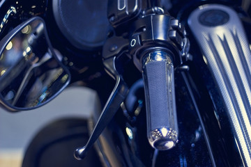 handlebar motorcycle in dark background, soft focus and blur
