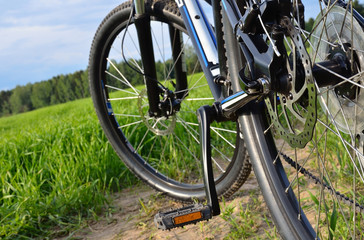Fototapeta na wymiar Mountain bike in countryside. Selective focus