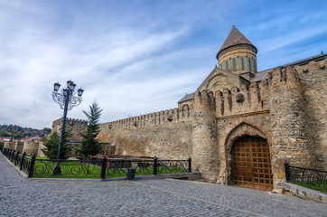 Fototapeta na wymiar Entrance to Svetitskhoveli Cathedral, a Georgian Orthodox cathedral