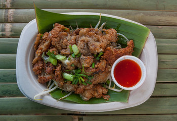 Crispy fried mussel with egg, Thai food.
