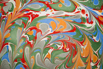 Ebru art. Traditional Turkish Ebru technique. Painting on water, followed by paper prints. Color...