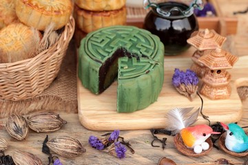 Festival moon cake - china dessert with green tea.