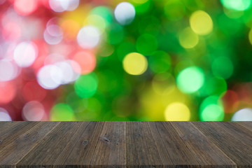 Wood terrace and Abstract bokeh background of Christmas tree