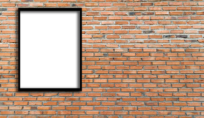 white frame hanging on a brick wall