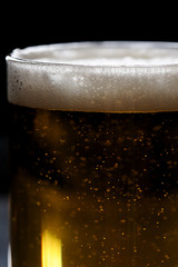close up of glass with beer