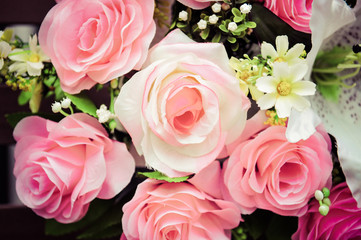 The pink rose close up and their leaf , vintage style