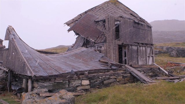 Abandoned house in Hebron, Newfoundland and Labrador on a snowy day.