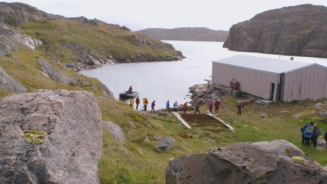 Expeditioners exploring an abandoned town in Northern Quebec.