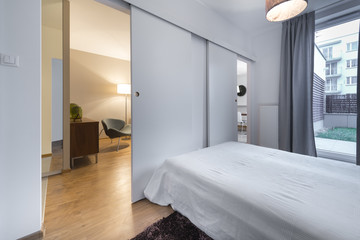 Fototapeta na wymiar Modern bedroom in new apartment