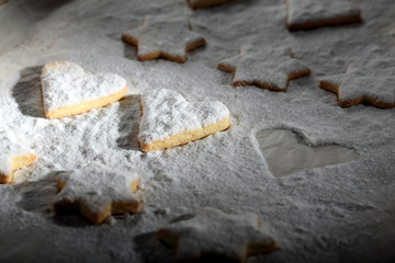 Homemade cookies with powdered sugar on a baking tray bakery