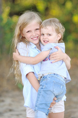 Fototapeta premium portrait of two girls of girlfriends on a summer nature