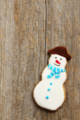Gingerbread cookies on a grey wooden table