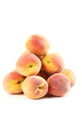 Fresh peaches fruit isolated on a white