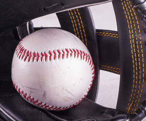 Baseball in glove
