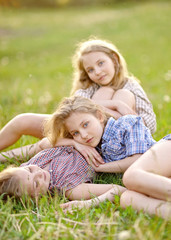 Portrait of three girlfriends on the nature