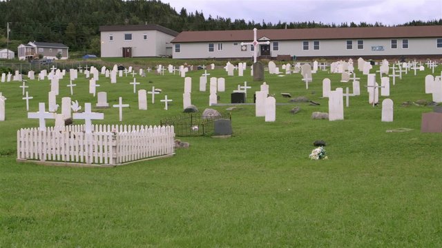A cemetery in Conche, Newfoundland & Labrador. Pan Left