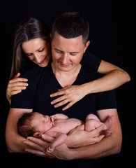 Happy family with newborn