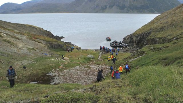 Time-lapse of expeditioners loading into zodiac boats in Torngat Mountains.