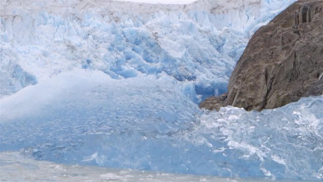 Traveling shot of a glacier in Greenland. Slow Motion