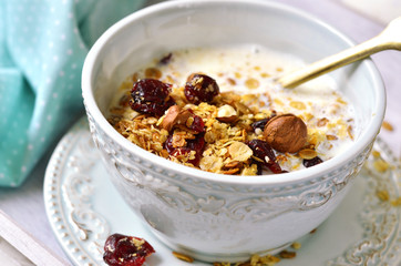 Homemade granola with milk- healthy breakfast.