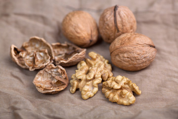 Walnut without shell close-up, and nuts in the shell