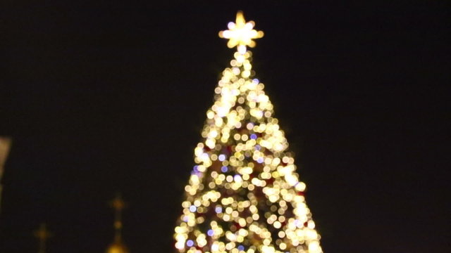New Year's tree made from golden bokeh lights