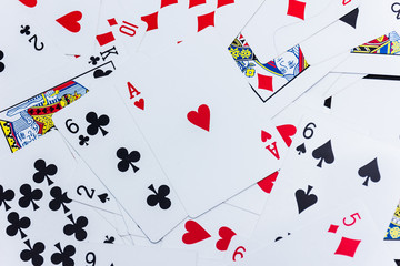 Lot of dusty old playing cards.