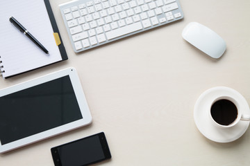 Office supplies on the wooden desk