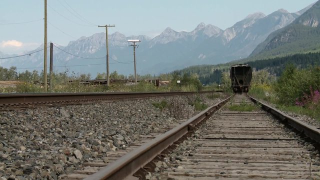 A tanker train car beneath the Bugaboo Mountains.