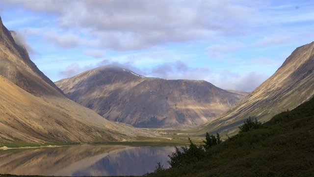 Time-lapse of clouds moving over Torngat Mountains.