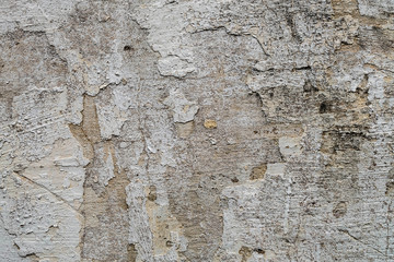 Textured walls with dirt.