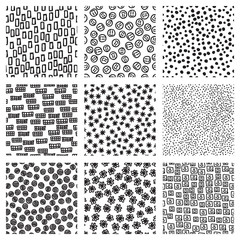 Vector set of seamless patterns. Sketch backgrounds with spirals, helix, smile face, rings, polka dots, stars, flowers, butterfly, hearts, squares and ovals. Hand drawn hipster doodles.