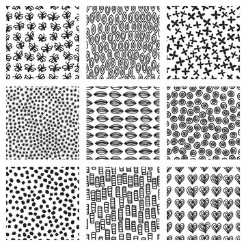 Vector set of seamless patterns. Sketch backgrounds with spirals, helix, smile face, rings, polka dots, stars, flowers, butterfly, hearts, squares and ovals. Hand drawn hipster doodles.