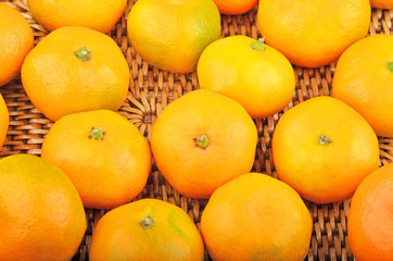 Mandarin on wickered background