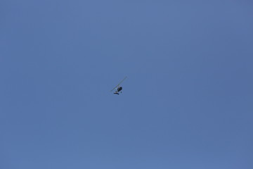 transport helicopter with load in the sky
