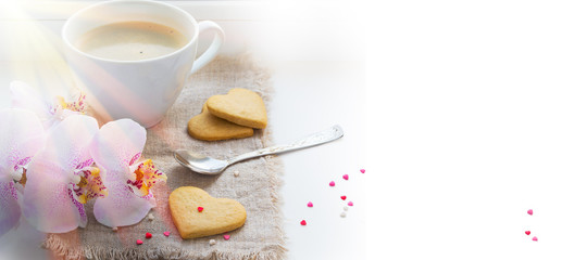 Background Valentine's Day with pink orchid, coffee, cookies, he