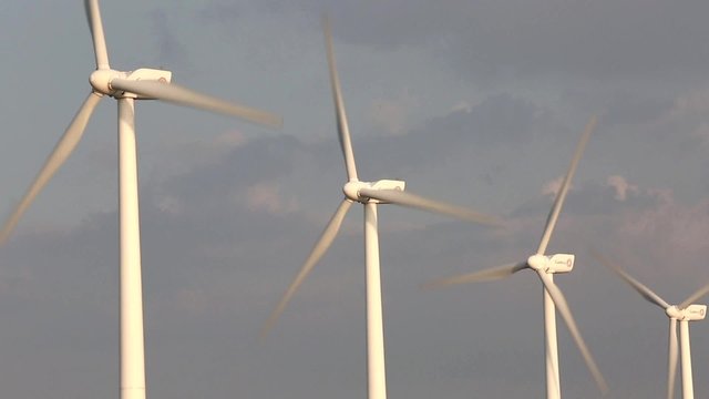 View of turbines of wind farm on the shore of Puttalam Lagoon in Sri Lanka 
