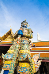 Fototapeta na wymiar Giant statue at Temple of the Emerald Buddha (Wat pra kaew) 
